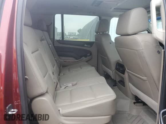 2019 Chevrolet Suburban Premier z VIN 1GNSKJKC8KR326232, wystawiony jako Copart lot #70490135 z przebiegiem Nie podano mil oraz Szkoda całkowita • Salvage title. Historia ofert i sprzedaży dostępna na DreamBid. Obrazek 11.