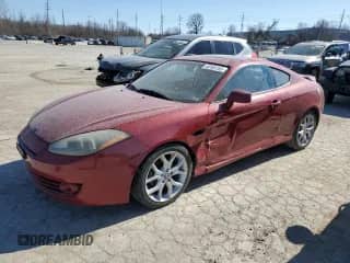 2007 Hyundai Tiburon GT с VIN KMHHN66F27U255380, выставлен на аукционе Copart как лот 48105165 с пробегом 142 966 миль миль и Списание • Salvage title. История ставок и продаж доступна на DreamBid. Изображение 1.