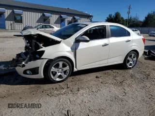✅ 2013 Chevrolet Sonic LTZ • VIN: 1G1JE5SH0D4172994 • Lot: 91007625. Listed on Copart with 121,117 mi. Free auction sales archive from the USA and detailed vehicle history report at DreamBid. Image 1.