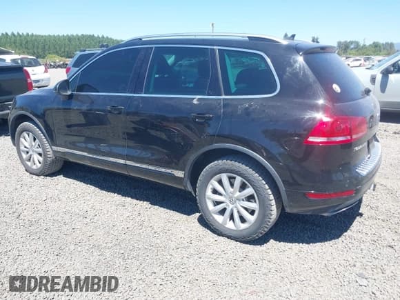 ✅ 2011 Volkswagen Touareg Sport • VIN: WVGFF9BP7BD007333 • Лот: 42748183. Опубликован ранее на IAAI с пробегом 131 324 миль. Бесплатный доступ к архиву аукционных продаж из США и подробный отчёт об истории автомобиля на DreamBid. Изображение 3.