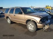 ✅ 2004 Chevrolet Blazer LS • VIN: 1GNDT13X74K143228 • Lot: 41761295. Wystawiony na IAAI z przebiegiem 149 003 mil. Bezpłatny archiwum sprzedaży aukcyjnych z USA i szczegółowy raport historii pojazdu na DreamBid. Zdjęcie 1.