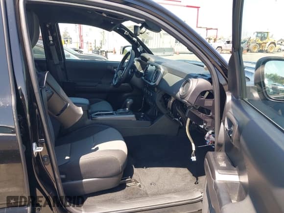 ✅ 2023 Toyota Tacoma SR • VIN: 3TMCZ5AN4PM602174 • Lot: 42851127. Listed on IAAI with 28,356 mi. Free auction sales archive from the USA and detailed vehicle history report at DreamBid. Image 5.