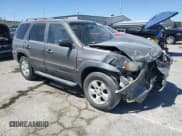 ✅ 2003 Mazda Tribute ES • VIN: 4F2CZ06113KM34892 • Lot: 66942765. Listed on Copart with 240,643 mi. Free auction sales archive from the USA and detailed vehicle history report at DreamBid. Image 4.