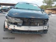 ✅ 2022 Toyota Corolla LE • VIN: 5YFEPMAE5NP272060 • Lot: 43303928. Listed on IAAI with 98,102 mi. Free auction sales archive from the USA and detailed vehicle history report at DreamBid. Image 13.