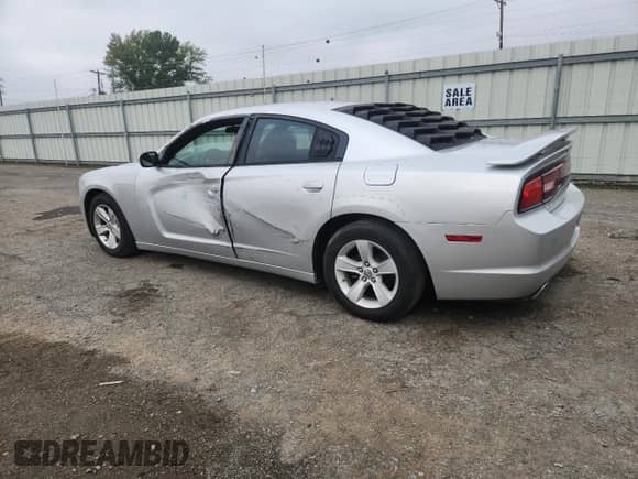 2012 Dodge Charger SE z VIN 2C3CDXBG2CH119614, wystawiony jako Copart lot #89668065 z przebiegiem 198 166 mil mil oraz Szkoda całkowita • Salvage title. Historia ofert i sprzedaży dostępna na DreamBid. Obrazek 2.