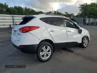 2013 Hyundai Tucson GLS with VIN KM8JU3AC6DU757207, listed as a Copart auction lot 89450945 with 164,630 mi miles and Salvage title. Bid and sale history available at DreamBid. Image 3.