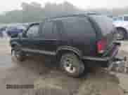 1995 Chevrolet Blazer z VIN 1GNCS13W5S2165022, wystawiony jako Copart lot #58006505 z przebiegiem 318 061 mil mil oraz Szkoda całkowita • Salvage title. Historia ofert i sprzedaży dostępna na DreamBid. Obrazek 2.