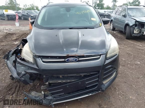 ✅ 2015 Ford Escape Titanium • VIN: 1FMCU9J94FUC39311 • Lot: 42542693. Listed on IAAI with 129,747 mi. Free auction sales archive from the USA and detailed vehicle history report at DreamBid. Image 12.