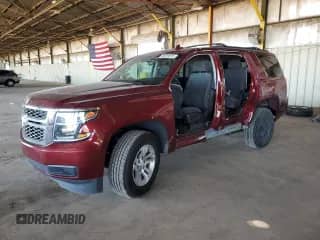 2018 Chevrolet Tahoe LS with VIN 1GNSCAKC7JR388409, listed as a Copart auction lot 86323815 with 67,959 mi miles and Salvage title. Bid and sale history available at DreamBid. Image 1.