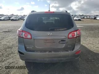 ✅ 2012 Hyundai Santa Fe GLS • VIN: 5XYZGDAB7CG164774 • Lot: 78517034. Listed on Copart with 267,198 mi. Free auction sales archive from the USA and detailed vehicle history report at DreamBid. Image 6.