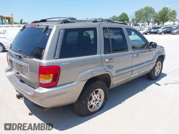 ✅ 1999 Jeep Grand Cherokee Limited • VIN: 1J4GW68S2XC675499 • Лот: 42887084. Опубликован ранее на IAAI с пробегом 167 420 миль. Бесплатный доступ к архиву аукционных продаж из США и подробный отчёт об истории автомобиля на DreamBid. Изображение 4.