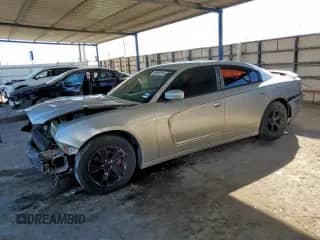 2012 Dodge Charger SE with VIN 2C3CDXBG8CH287306, listed as a Copart auction lot 84903545 with 203,624 mi miles and Salvage title. Bid and sale history available at DreamBid. Image 1.