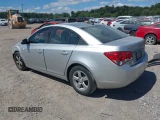 ✅ 2015 Chevrolet Cruze LT • VIN: 1G1PC5SB7F7180748 • Lot: 43118576. Wystawiony na IAAI z przebiegiem 106 511 mil. Bezpłatny archiwum sprzedaży aukcyjnych z USA i szczegółowy raport historii pojazdu na DreamBid. Zdjęcie 3.
