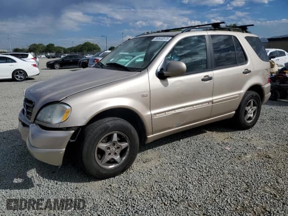 ✅ 2001 Mercedes-Benz M 320/430/500 • VIN: 4JGAB54E71A286387 • Лот: 89500875. Опубликован ранее на Copart с пробегом 197 637 миль. Бесплатный доступ к архиву аукционных продаж из США и подробный отчёт об истории автомобиля на DreamBid. Изображение 1.