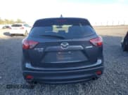 ✅ 2015 Mazda CX-5 Touring • VIN: JM3KE4CY0F0534604 • Lot: 91658385. Wystawiony na Copart z przebiegiem 88 263 mil. Bezpłatny archiwum sprzedaży aukcyjnych z USA i szczegółowy raport historii pojazdu na DreamBid. Zdjęcie 6.