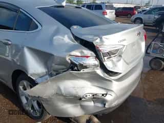 2017 Chevrolet Cruze Premier with VIN 1G1BF5SM0H7263153, listed as a IAAI auction lot 42981559 with 165,451 mi miles and . Bid and sale history available at DreamBid. Image 6.