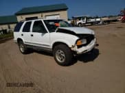 ✅ 1996 GMC Jimmy SL • VIN: 1GKDT13W3T2555469 • Lot: 66480124. Wystawiony na Copart z przebiegiem Nie podano. Bezpłatny archiwum sprzedaży aukcyjnych z USA i szczegółowy raport historii pojazdu na DreamBid. Zdjęcie 11.