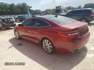 ✅ 2013 Hyundai Azera • VIN: KMHFH4JG8DA330003 • Лот: 66338915. Опубликован ранее на Copart с пробегом 141 010 миль. Бесплатный доступ к архиву аукционных продаж из США и подробный отчёт об истории автомобиля на DreamBid. Изображение 2.