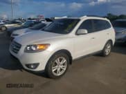 ✅ 2012 Hyundai Santa Fe Limited • VIN: 5XYZK4AG0CG104670 • Lot: 74339274. Listed on Copart with 69,102 mi. Free auction sales archive from the USA and detailed vehicle history report at DreamBid. Image 1.