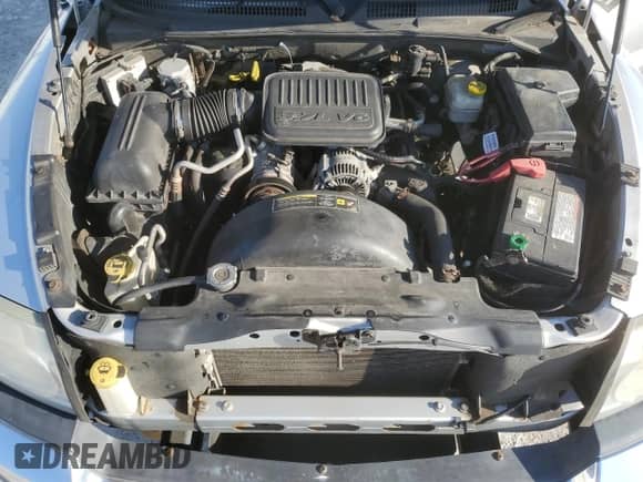 2005 Dodge Dakota SLT с VIN 1D7HW42K35S305792, выставлен на аукционе Copart как лот 63287344 с пробегом 97 440 миль миль и Списание • Salvage title. История ставок и продаж доступна на DreamBid. Изображение 13.