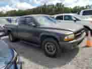 2002 Dodge Dakota Sport z VIN 1B7GL32X62S716927, wystawiony jako Copart lot #74025774 z przebiegiem Nie podano mil oraz Szkoda całkowita • Salvage title. Historia ofert i sprzedaży dostępna na DreamBid. Obrazek 4.