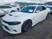 2015 Dodge Charger SRT Hellcat z VIN 2C3CDXL99FH836323, wystawiony jako IAAI lot #42445379 z przebiegiem 26 791 mil mil oraz . Historia ofert i sprzedaży dostępna na DreamBid. Obrazek 19.