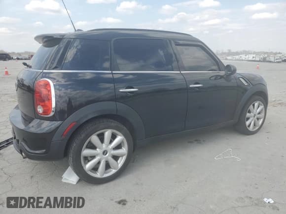 ✅ 2014 MINI Countryman S • VIN: WMWZC3C51EWP26751 • Lot: 49165415. Listed on Copart with 131,590 mi. Free auction sales archive from the USA and detailed vehicle history report at DreamBid. Image 3.