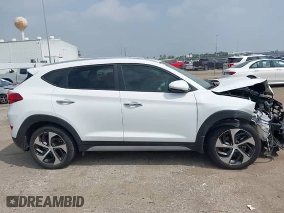 2018 Hyundai Tucson Limited with VIN KM8J33A22JU677697, listed as a IAAI auction lot 41780870 with 93,992 mi miles and . Bid and sale history available at DreamBid. Image 13.