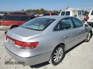 2006 Hyundai Azera SE z VIN KMHFC46F16A048898, wystawiony jako Copart lot #77953824 z przebiegiem 110 623 mil mil oraz Szkoda całkowita • Salvage title. Historia ofert i sprzedaży dostępna na DreamBid. Obrazek 3.
