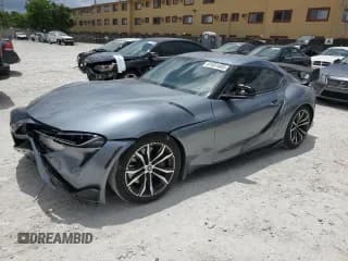 ✅ 2020 Toyota Supra 3.0 • VIN: WZ1DB4C02LW030327 • Лот: 61451485. Опубликован ранее на Copart с пробегом 85 250 миль. Бесплатный доступ к архиву аукционных продаж из США и подробный отчёт об истории автомобиля на DreamBid. Изображение 1.