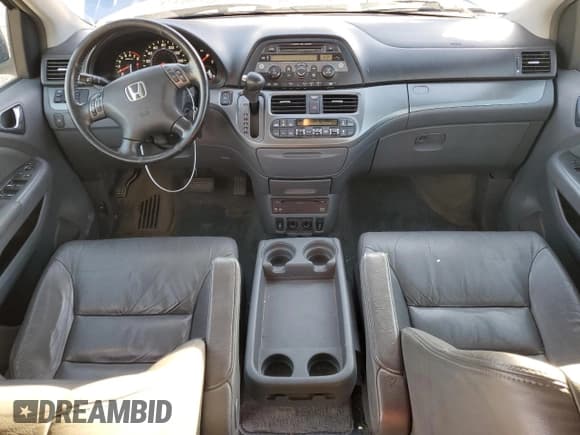 ✅ 2006 Honda Odyssey EX-L • VIN: 5FNRL38746B123750 • Лот: 90249165. Опубликован ранее на Copart с пробегом 264 175 миль. Бесплатный доступ к архиву аукционных продаж из США и подробный отчёт об истории автомобиля на DreamBid. Изображение 8.