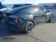 ✅ 2022 Tesla Model Y Long Range • VIN: 7SAYGDEE0NF351433 • Lot: 43582029. Listed on IAAI with 69,170 mi. Free auction sales archive from the USA and detailed vehicle history report at DreamBid. Image 4.
