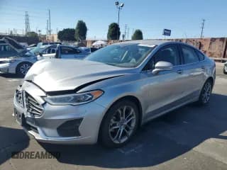 ✅ 2020 Ford Fusion SEL • VIN: 3FA6P0CD6LR175447 • Лот: 81865065. Опубликован ранее на Copart с пробегом 98 756 миль. Бесплатный доступ к архиву аукционных продаж из США и подробный отчёт об истории автомобиля на DreamBid. Изображение 1.