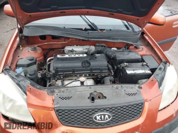 ✅ 2009 Kia Rio LX • VIN: KNADE223596580617 • Lot: 43727560. Wystawiony na IAAI z przebiegiem 243 386 mil. Bezpłatny archiwum sprzedaży aukcyjnych z USA i szczegółowy raport historii pojazdu na DreamBid. Zdjęcie 9.