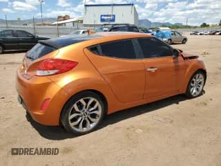 ✅ 2015 Hyundai Veloster • VIN: KMHTC6AD5FU222054 • Lot: 71016734. Wystawiony na Copart z przebiegiem 64 330 mil. Bezpłatny archiwum sprzedaży aukcyjnych z USA i szczegółowy raport historii pojazdu na DreamBid. Zdjęcie 3.