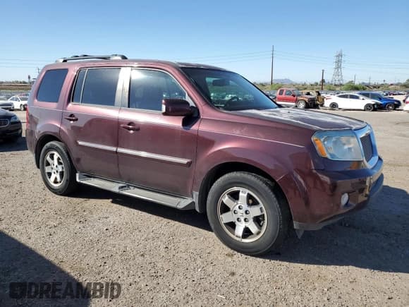 ✅ 2011 Honda Pilot Touring • VIN: 5FNYF3H96BB049732 • Lot: 91220855. Listed on Copart with 175,533 mi. Free auction sales archive from the USA and detailed vehicle history report at DreamBid. Image 4.