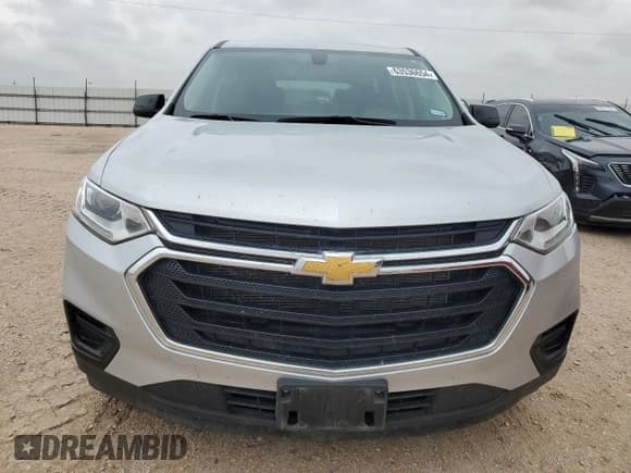✅ 2021 Chevrolet Traverse LS • VIN: 1GNERFKW0MJ271177 • Lot: 63536654. Wystawiony na Copart z przebiegiem 42 452 mil. Bezpłatny archiwum sprzedaży aukcyjnych z USA i szczegółowy raport historii pojazdu na DreamBid. Zdjęcie 5.