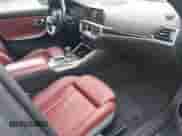 2022 BMW 3 Series 330i xDrive with VIN WBA5R7C05NFM16689, listed as a IAAI auction lot 42530938 with 56,777 mi miles and . Bid and sale history available at DreamBid. Image 5.