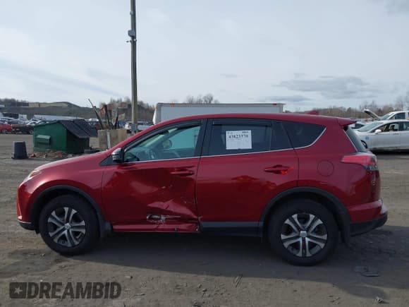✅ 2018 Toyota RAV4 LE • VIN: 2T3BFREV9JW857608 • Lot: 43823370. Listed on IAAI with 22,018 mi. Free auction sales archive from the USA and detailed vehicle history report at DreamBid. Image 14.