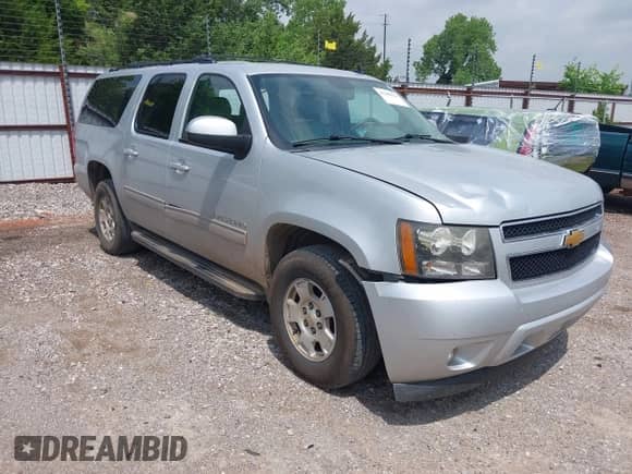 2014 Chevrolet Suburban LT z VIN 1GNSCJE07ER241238, wystawiony jako IAAI lot #42280316 z przebiegiem 168 704 mil mil oraz . Historia ofert i sprzedaży dostępna na DreamBid. Obrazek 1.