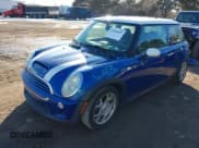 ✅ 2005 MINI Hardtop S • VIN: WMWRE33465TD95588 • Lot: 41440652. Listed on IAAI with 121,363 mi. Free auction sales archive from the USA and detailed vehicle history report at DreamBid. Image 2.