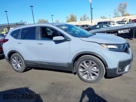 ✅ 2020 Honda CR-V Touring • VIN: 7FARW1H98LE010042 • Lot: 43708190. Listed on IAAI with 27,832 mi. Free auction sales archive from the USA and detailed vehicle history report at DreamBid. Image 13.