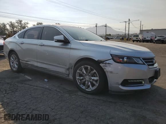 ✅ 2018 Chevrolet Impala LT • VIN: 2G1105S37J9100590 • Лот: 71194434. Опубликован ранее на Copart с пробегом 70 503 миль. Бесплатный доступ к архиву аукционных продаж из США и подробный отчёт об истории автомобиля на DreamBid. Изображение 4.