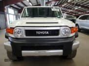 ✅ 2013 Toyota FJ Cruiser • VIN: JTEBU4BF2DK165995 • Lot: 70801295. Wystawiony na Copart z przebiegiem 246 386 mil. Bezpłatny archiwum sprzedaży aukcyjnych z USA i szczegółowy raport historii pojazdu na DreamBid. Zdjęcie 5.