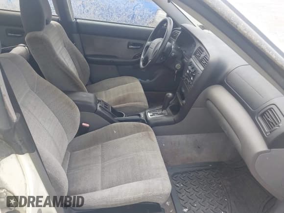 ✅ 2001 Subaru Legacy L • VIN: 4S3BH635617302512 • Lot: 42506031. Listed on IAAI with 163,427 mi. Free auction sales archive from the USA and detailed vehicle history report at DreamBid. Image 5.