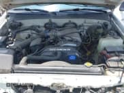 ✅ 1995 Toyota T100 SR5 • VIN: JT4VD12F8S0013406 • Лот: 42465291. Опубликован ранее на IAAI с пробегом 205 683 миль. Бесплатный доступ к архиву аукционных продаж из США и подробный отчёт об истории автомобиля на DreamBid. Изображение 10.