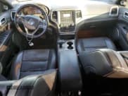 ✅ 2014 Jeep Grand Cherokee Summit • VIN: 1C4RJFJT1EC406889 • Lot: 87266965. Listed on Copart with 106,215 mi. Free auction sales archive from the USA and detailed vehicle history report at DreamBid. Image 8.