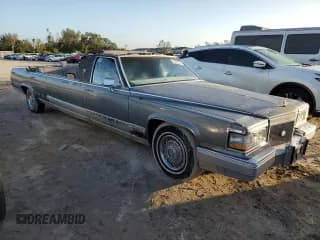 ✅ 1990 Cadillac Brougham • VIN: 1G6DW5472LR711206 • Lot: 75627814. Wystawiony na Copart z przebiegiem Nie podano. Bezpłatny archiwum sprzedaży aukcyjnych z USA i szczegółowy raport historii pojazdu na DreamBid. Zdjęcie 4.