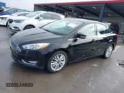 ✅ 2017 Ford Focus Titanium • VIN: 1FADP3J26HL267951 • Lot: 43728220. Listed on IAAI with 84,043 mi. Free auction sales archive from the USA and detailed vehicle history report at DreamBid. Image 2.