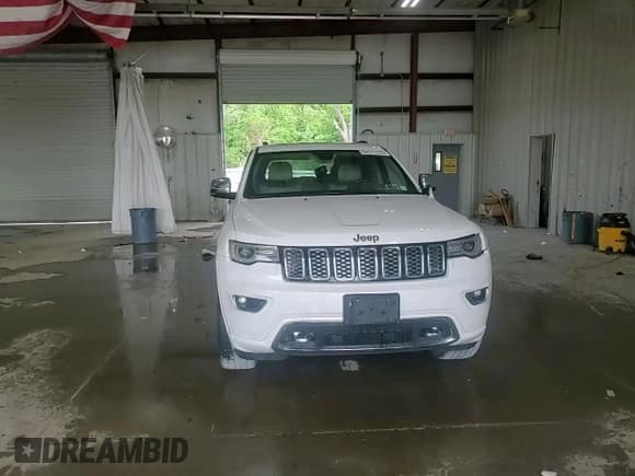 ✅ 2019 Jeep Grand Cherokee Overland • VIN: 1C4RJFCGXKC619805 • Lot: 64515375. Listed on Copart with 94,510 mi. Free auction sales archive from the USA and detailed vehicle history report at DreamBid. Image 14.